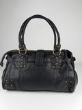 Borsa a mano nera con borchie dorate
