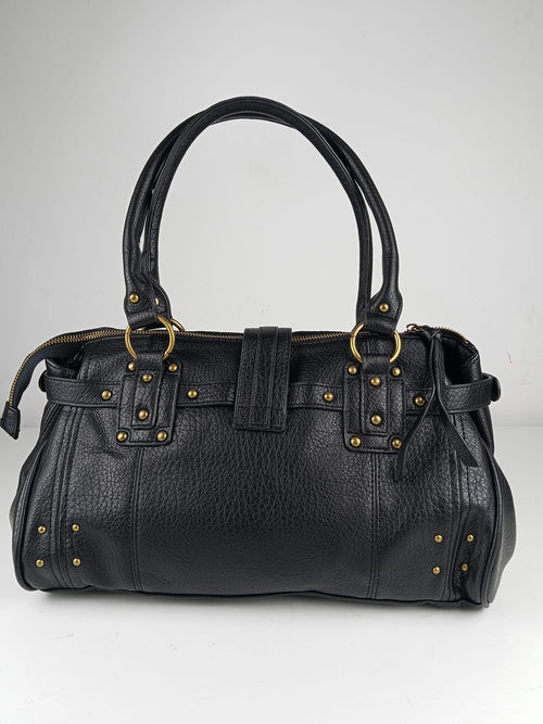 Borsa a mano nera con borchie dorate