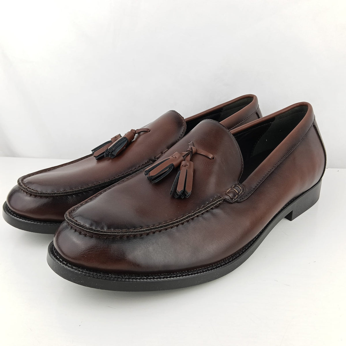 Mocassini Zara marrone scuro con nappine